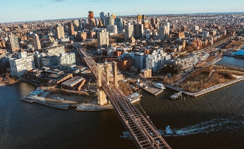 Aerial view of Brooklyn Bridge, leading into the city