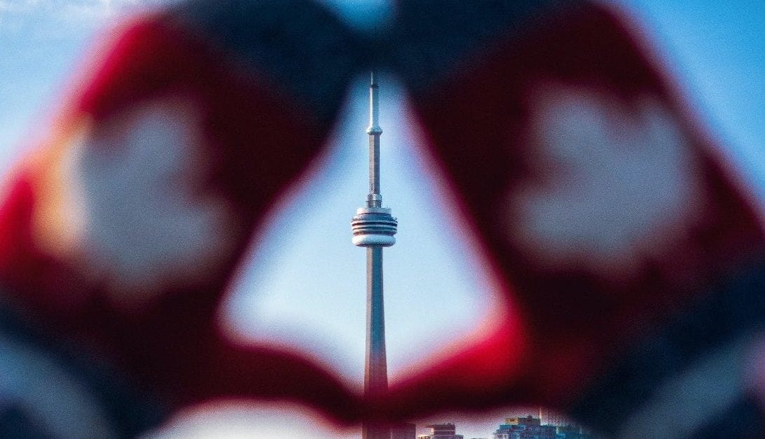 Gloved hands highlighting Canadian landmark