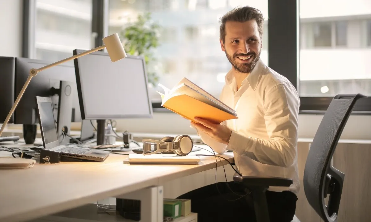 Adult at work desk