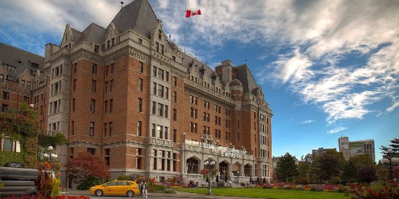 Architectural building with Canadian flag on top