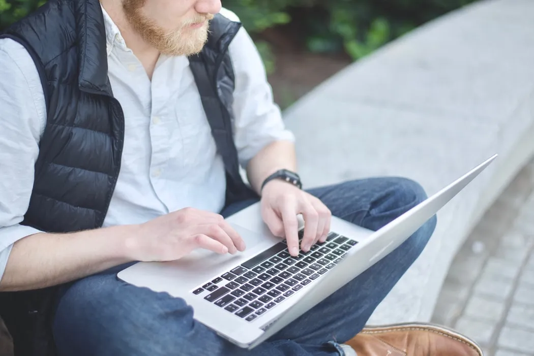 Person sat at laptop