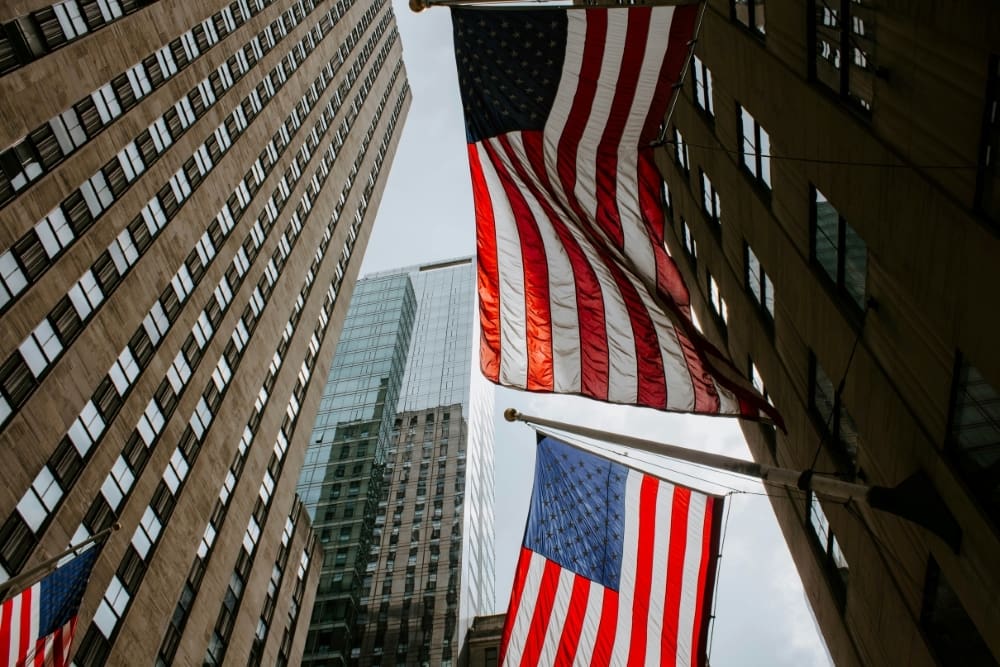 US flags handing down in a US city street