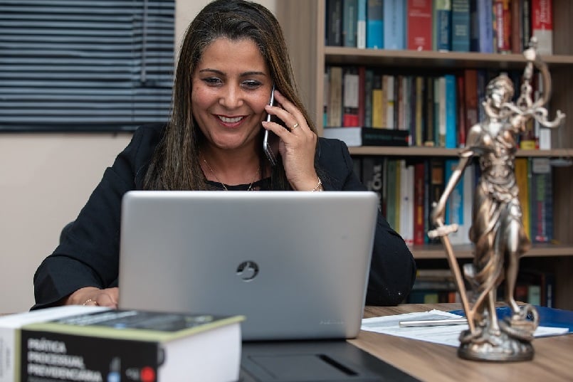 Lawyer on the phone with her client
