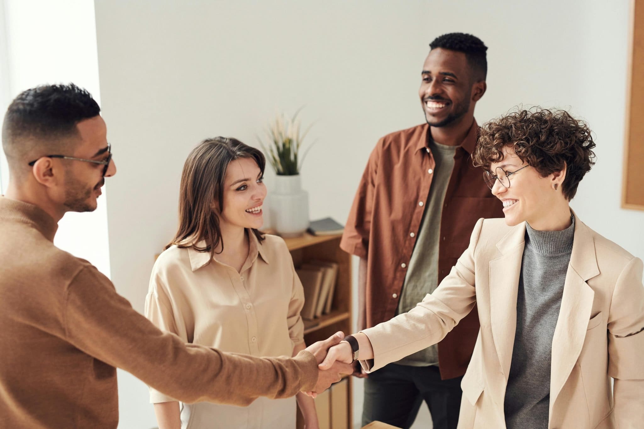 group of people doing handshakes