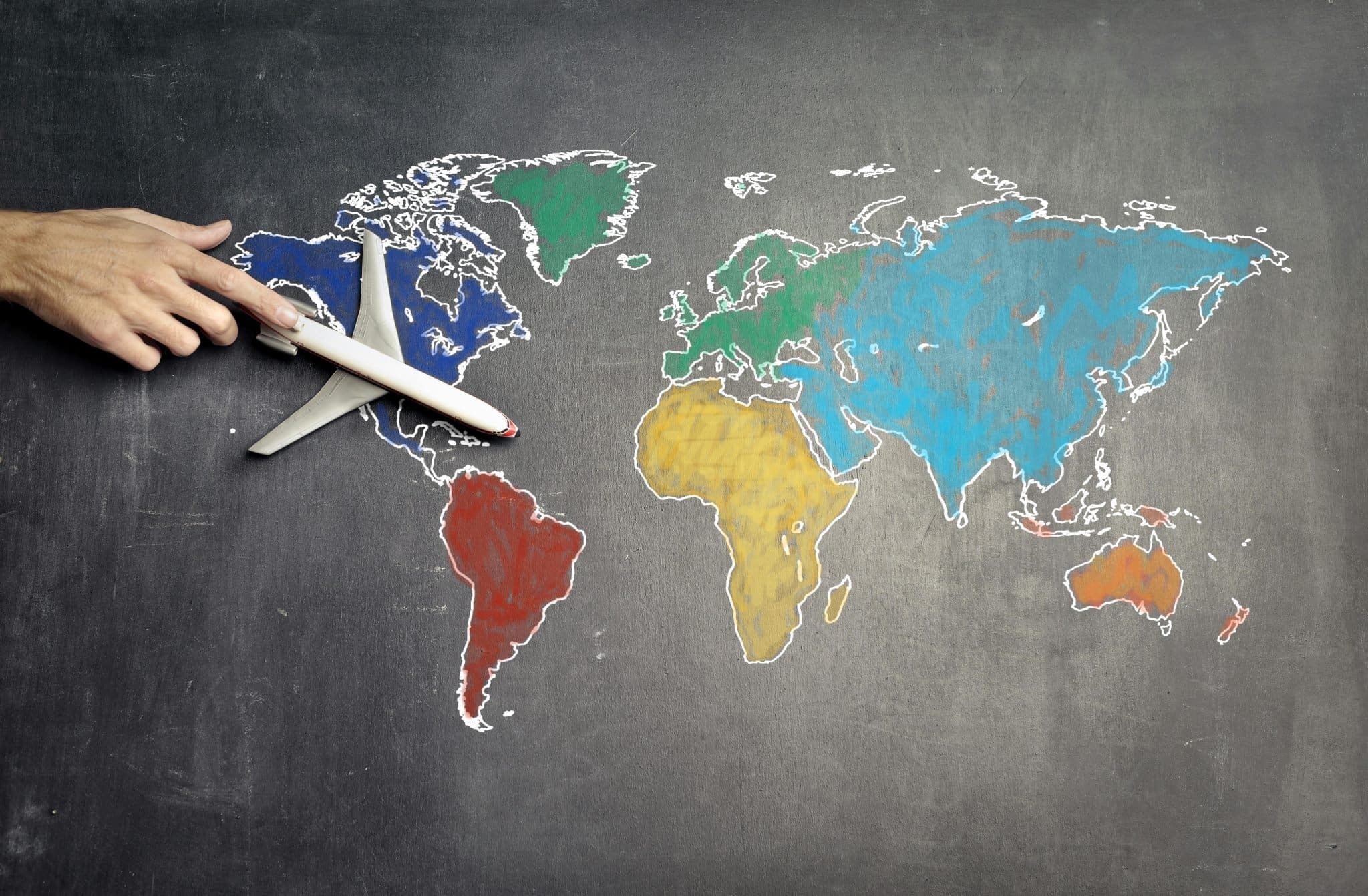 World map with toy plane